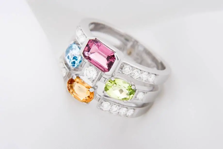 Colored Gems and Stones Set in Three Colorful Rings